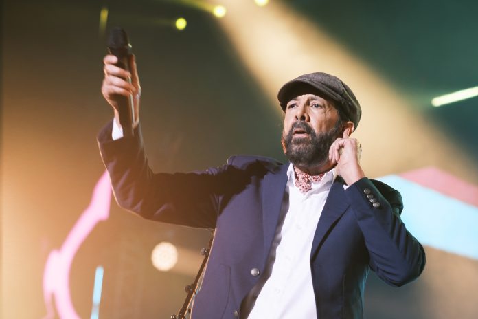 Singer,Juan,Luis,Guerra,,During,His,Performance,At,The,Wizink Juan Luis Guerra | Shutterstock